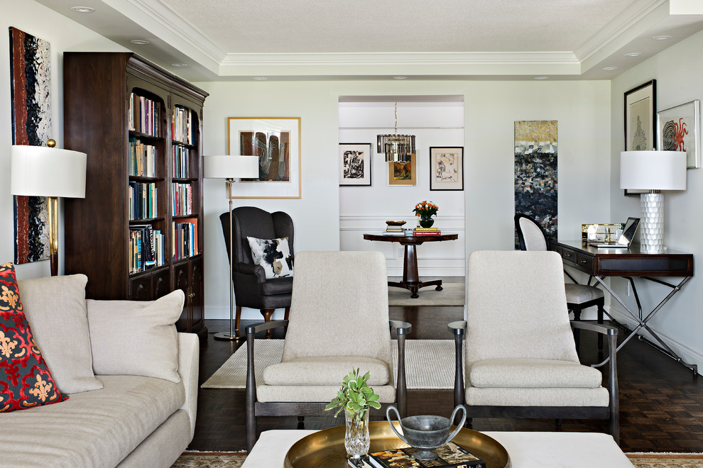 Inspiration for a mid-sized transitional open concept living room library remodel in Toronto with white walls