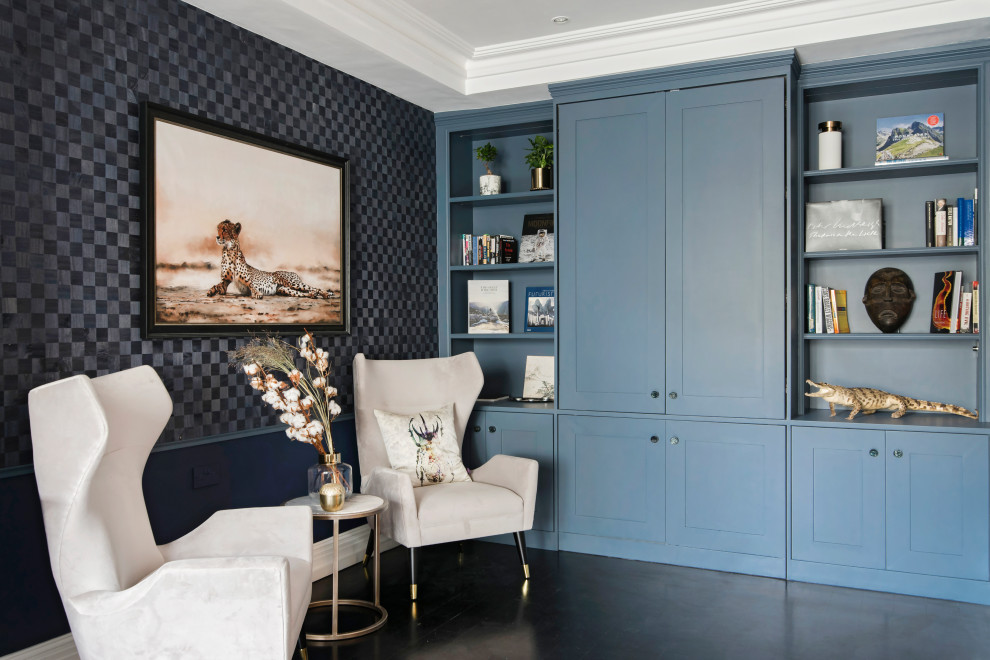 Photo of a large traditional living room in London with blue walls and black floors.