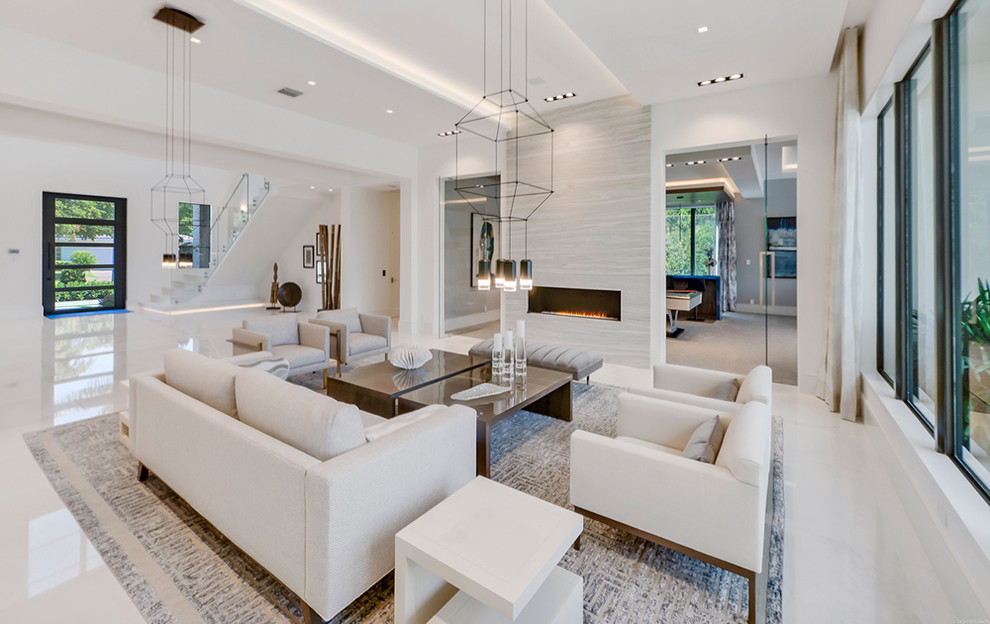 Mid-sized trendy formal and open concept marble floor living room photo in Miami with white walls, a ribbon fireplace and no tv
