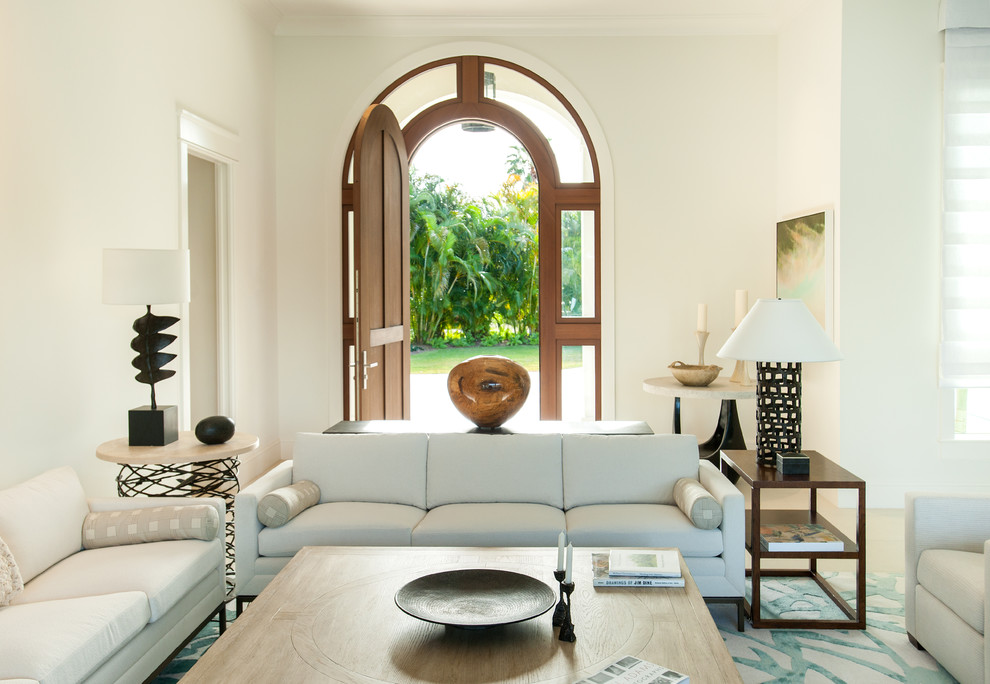 Inspiration for a medium sized mediterranean formal open plan living room in Tampa with white walls.