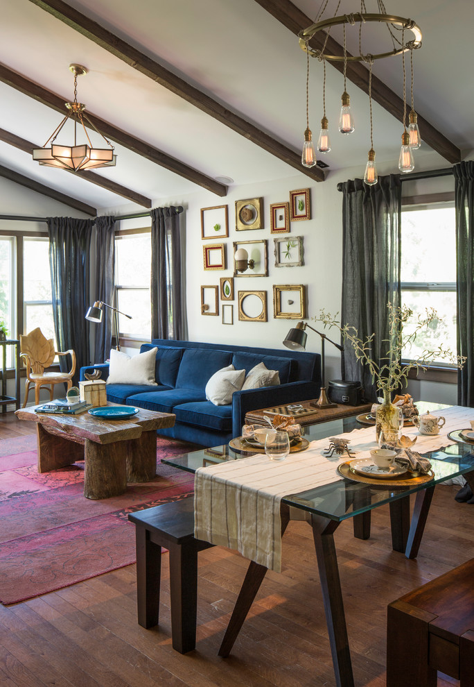 Eclectic open concept dark wood floor living room photo in Los Angeles with white walls