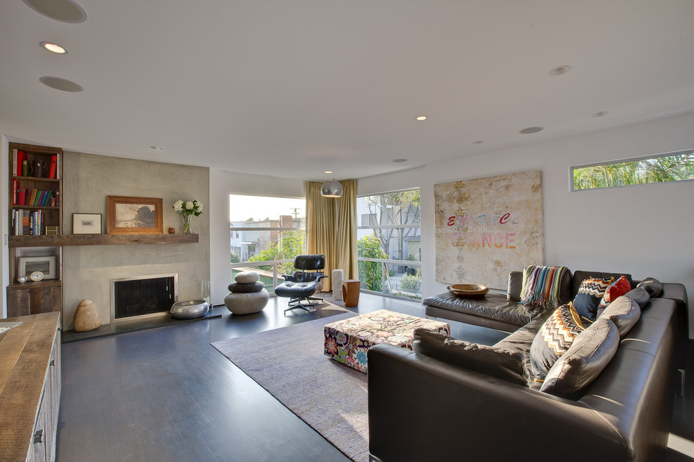 Expansive modern living room in Los Angeles with a standard fireplace.
