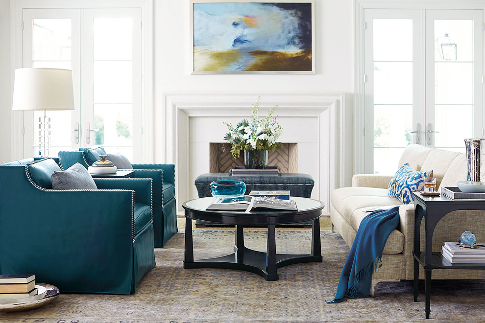 Inspiration for a classic living room in Los Angeles with white walls and a standard fireplace.