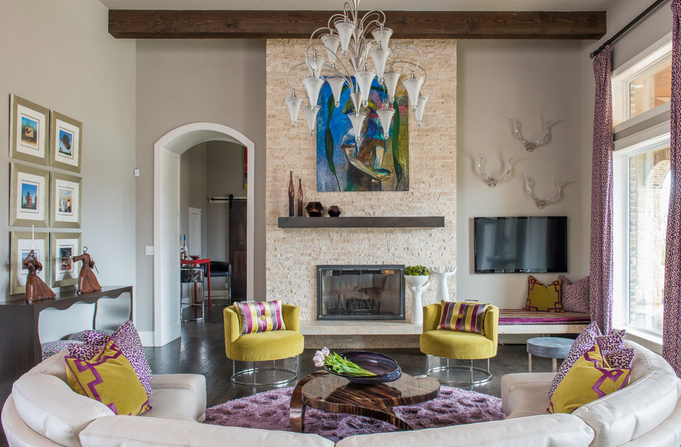 Living room - eclectic formal and enclosed dark wood floor living room idea in Dallas with beige walls, a ribbon fireplace, a wall-mounted tv and a stone fireplace