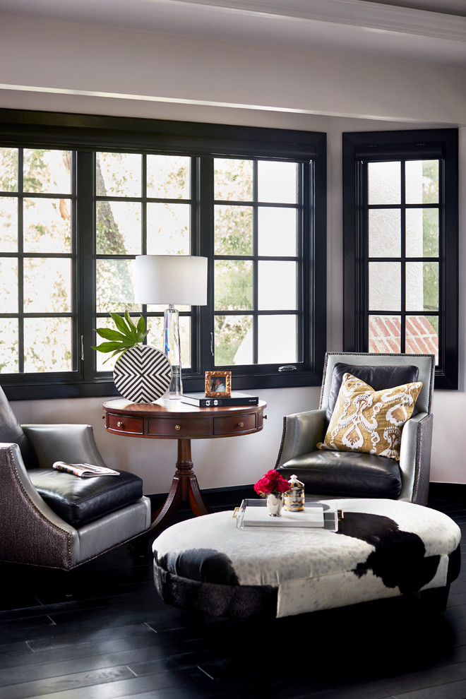 Transitional dark wood floor and black floor living room photo in Columbus with gray walls