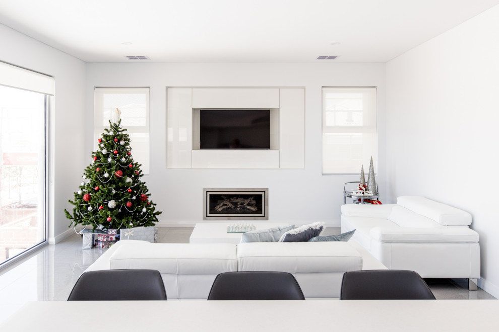 Photo of a contemporary open plan living room in Perth with white walls, a ribbon fireplace, a wall mounted tv and grey floors.