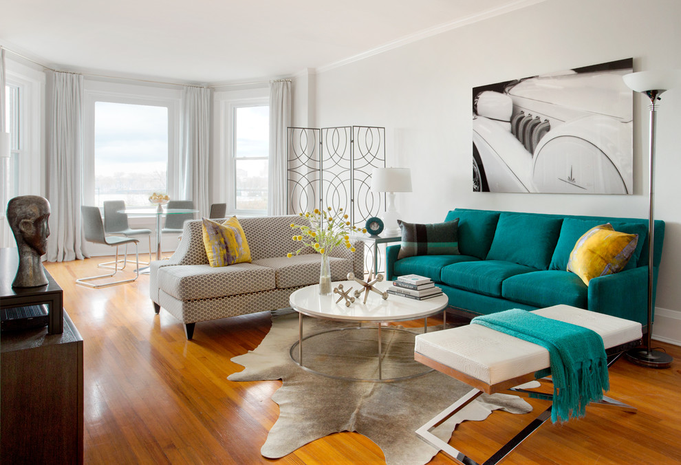 Living room - transitional open concept medium tone wood floor living room idea in Boston with gray walls
