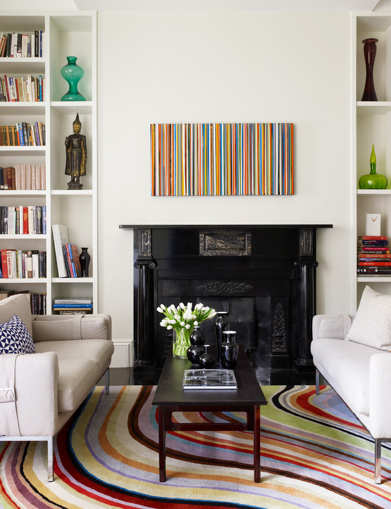 Inspiration for a contemporary living room library remodel in Boston with a standard fireplace and no tv