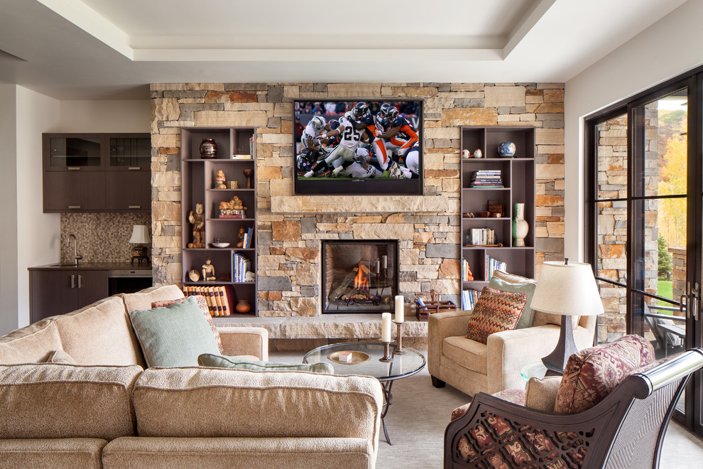 Large classic formal open plan living room in Denver with white walls, dark hardwood flooring, a standard fireplace, a stone fireplace surround, no tv and brown floors.