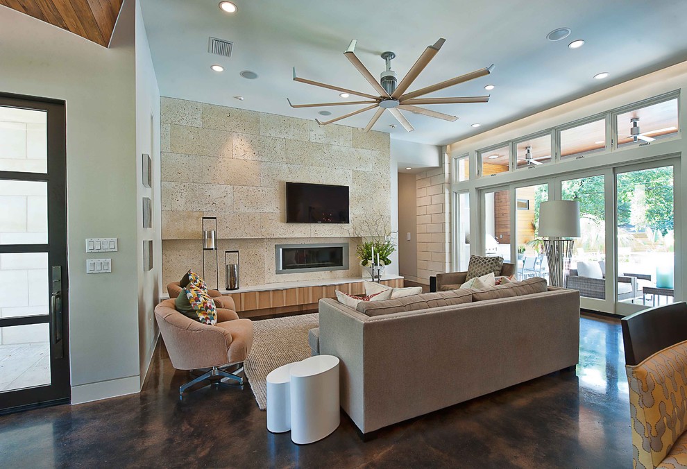 Trendy concrete floor living room photo in Austin