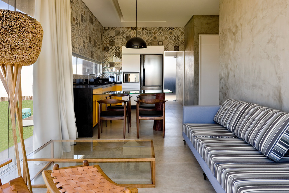 Idee per un soggiorno moderno con pavimento in cemento