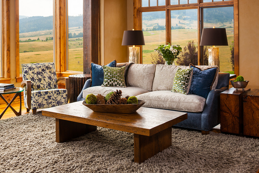 Photo of an expansive rustic open plan living room in Other with medium hardwood flooring.