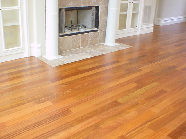 Inspiration for a large contemporary medium tone wood floor living room remodel in Austin