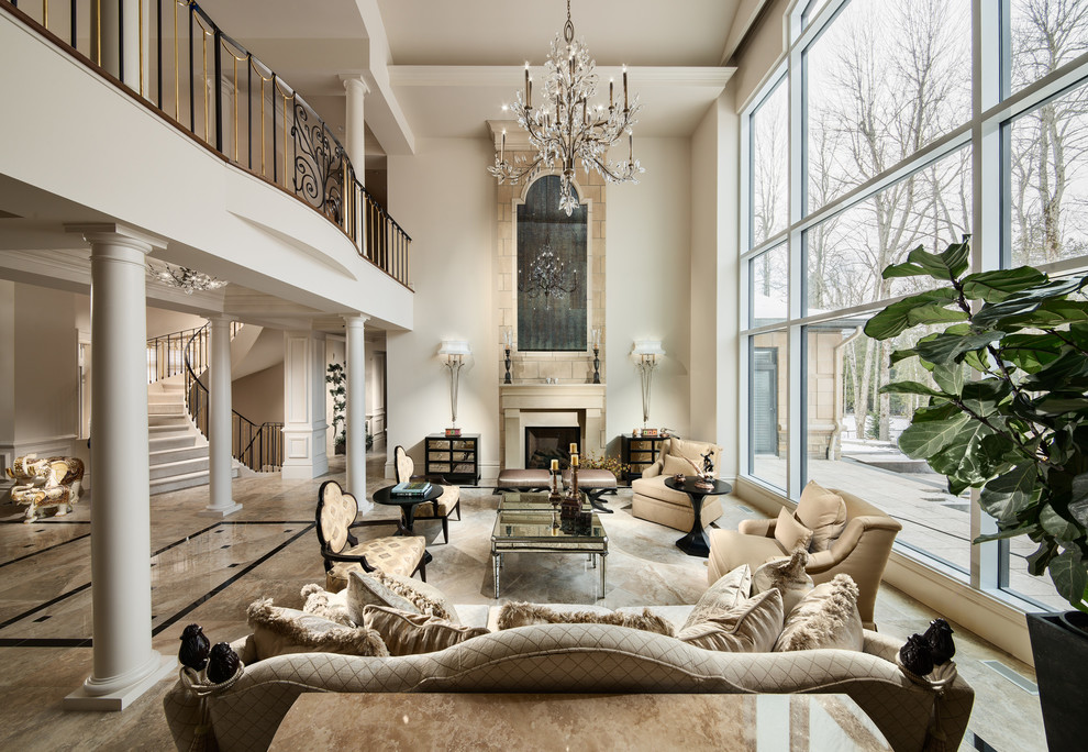 This is an example of a classic formal open plan living room in Ottawa with beige walls, a standard fireplace and no tv.