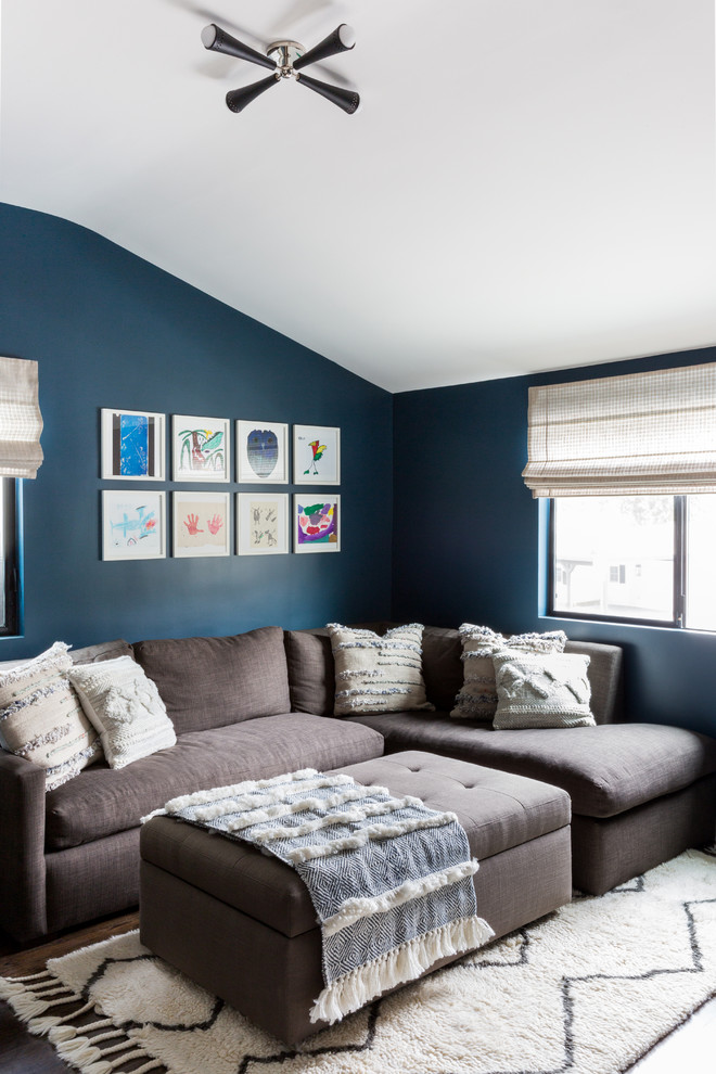 Inspiration for a small contemporary open concept dark wood floor and brown floor living room remodel in Los Angeles with blue walls