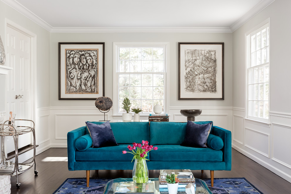Transitional dark wood floor and brown floor living room photo in New York with white walls