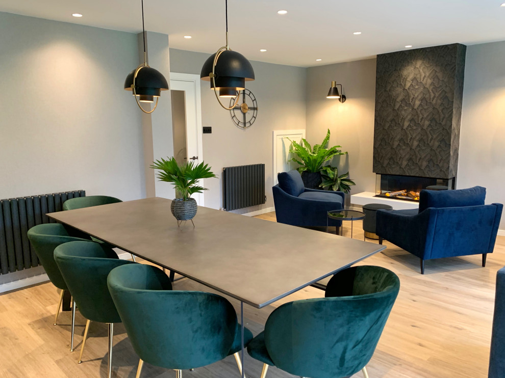 Living room - large modern open concept laminate floor living room idea in Hertfordshire