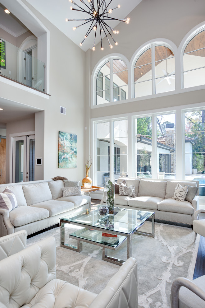 Inspiration for a large contemporary formal and open concept dark wood floor living room remodel in Houston with gray walls, no tv and no fireplace