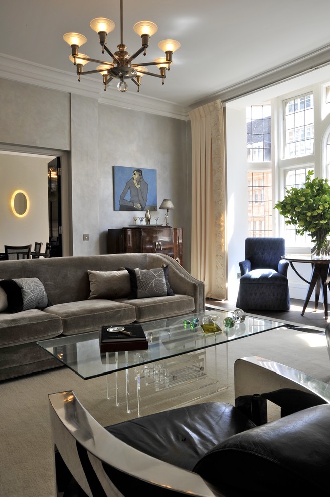 Inspiration for a large traditional living room in London with grey walls.