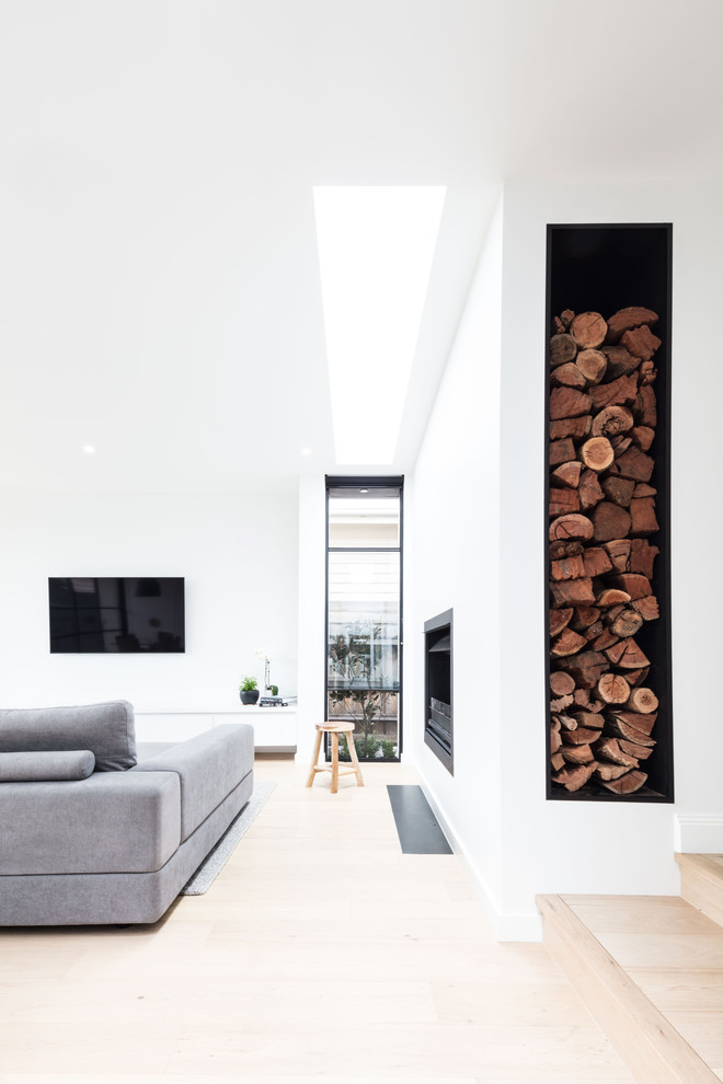 This is an example of a medium sized contemporary living room in Melbourne.