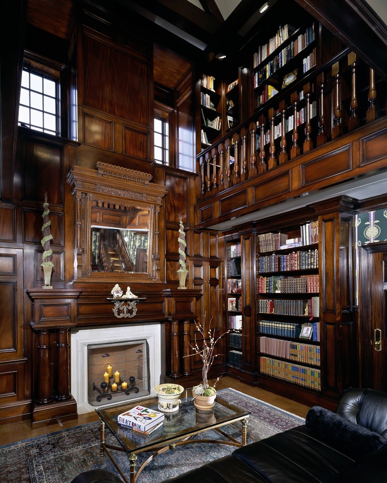 Living room library - traditional living room library idea in New York