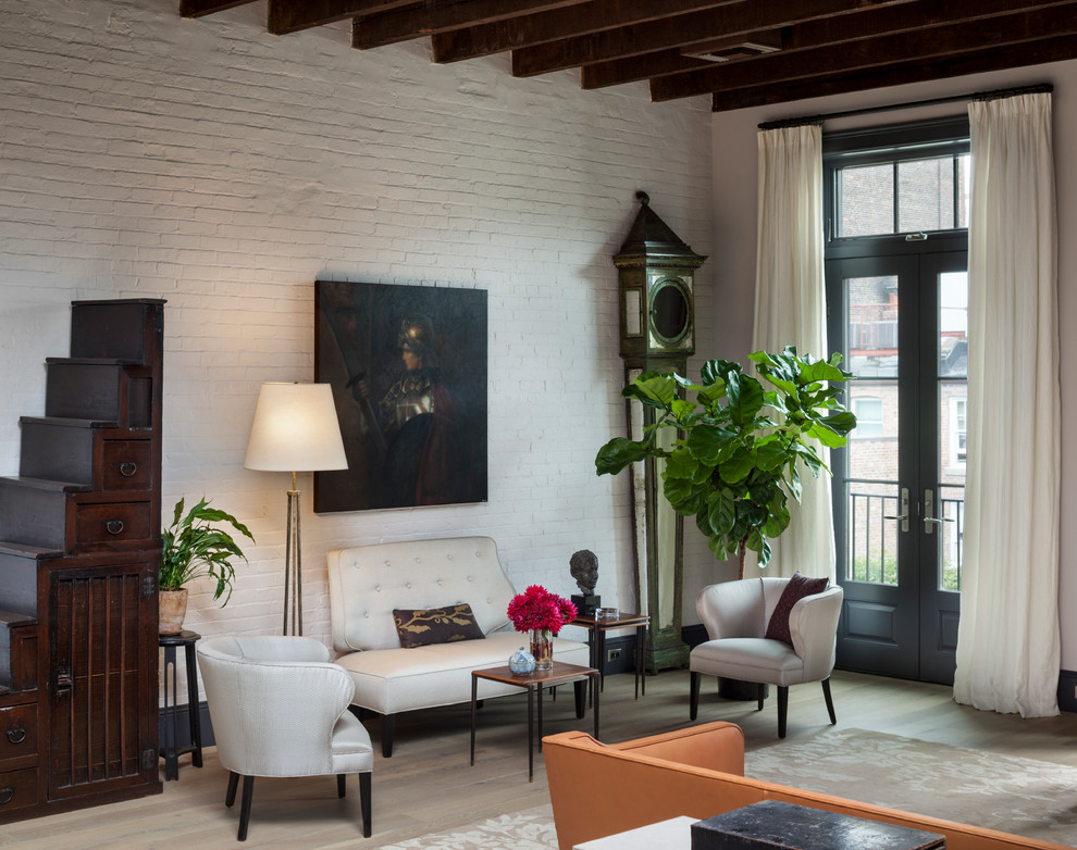 Inspiration for a classic mezzanine living room in New York with grey walls and light hardwood flooring.