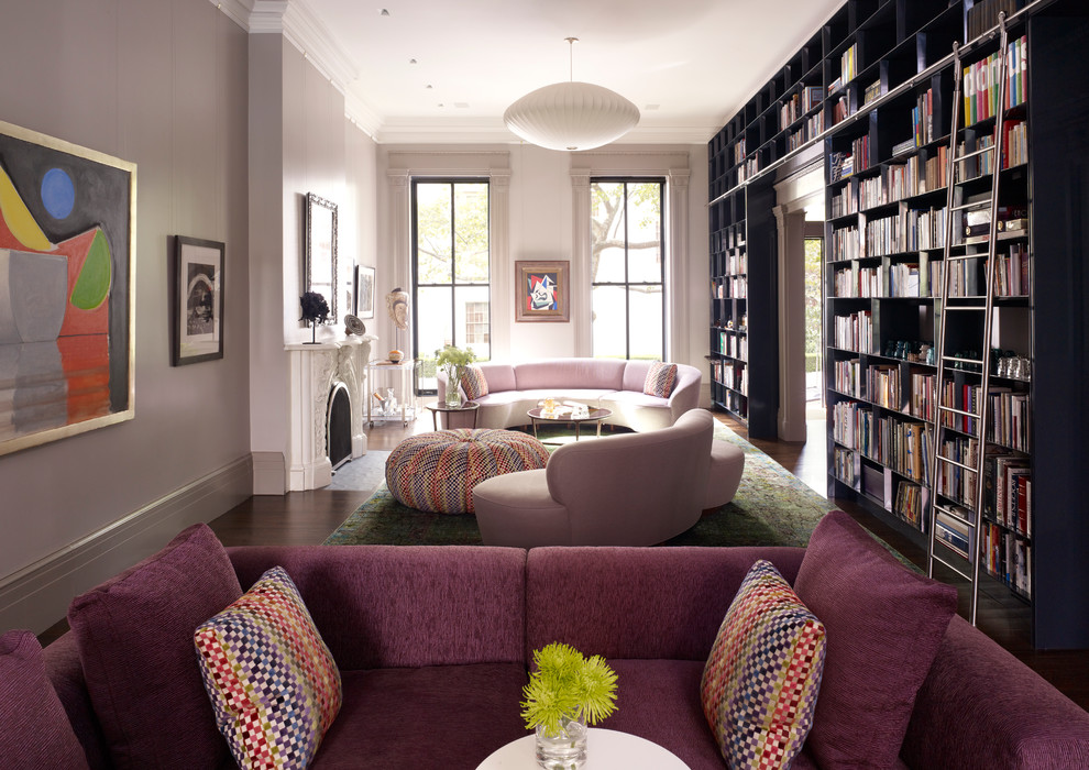 Example of a trendy living room library design in New York