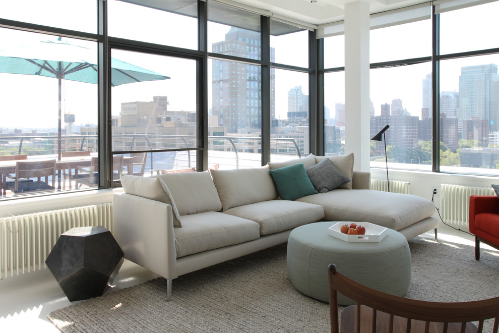 Foto di un soggiorno minimal con sala formale e pareti bianche