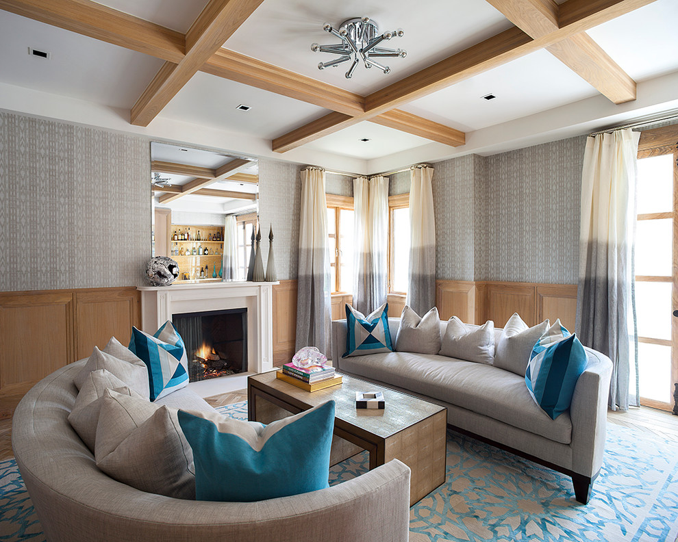 Immagine di un soggiorno design di medie dimensioni con sala formale, pareti multicolore e camino classico