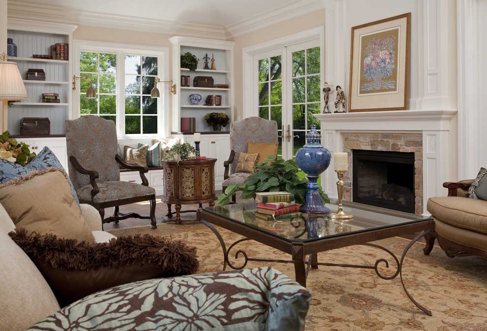 Inspiration for a timeless living room remodel in San Francisco with beige walls and a standard fireplace