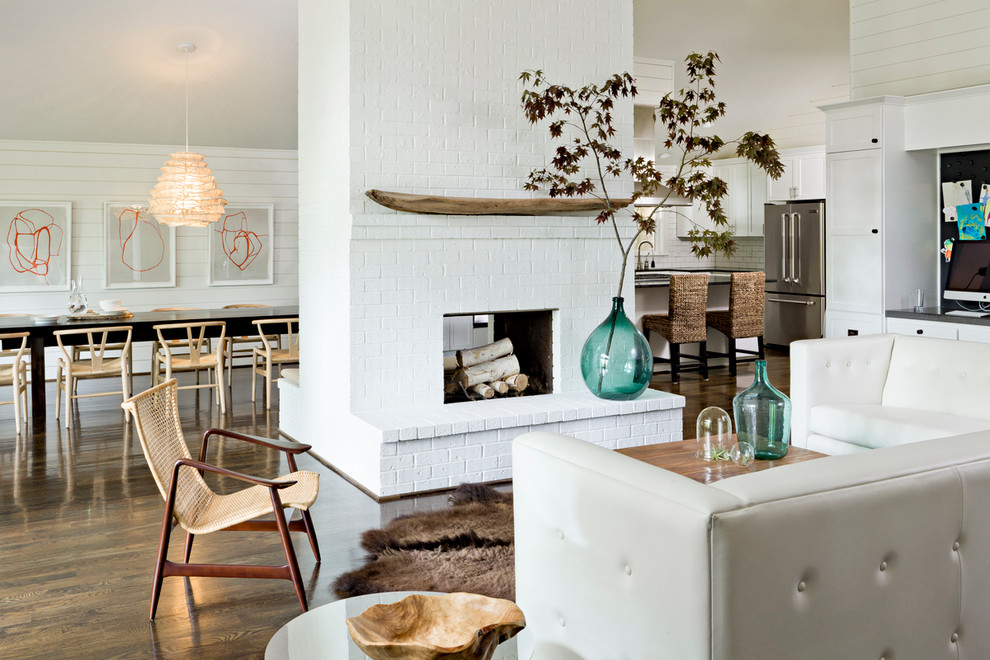 Trendy open concept living room photo in Portland with white walls, a two-sided fireplace and a brick fireplace