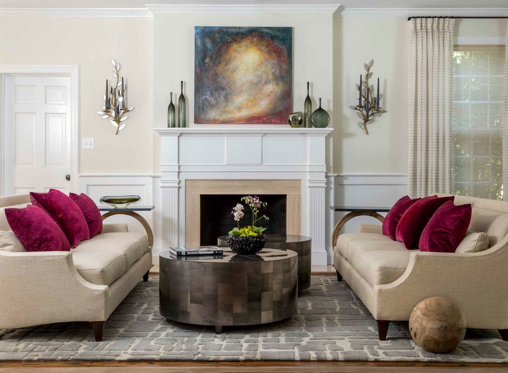 Example of a mid-sized transitional formal and open concept medium tone wood floor living room design in Philadelphia with beige walls and a standard fireplace