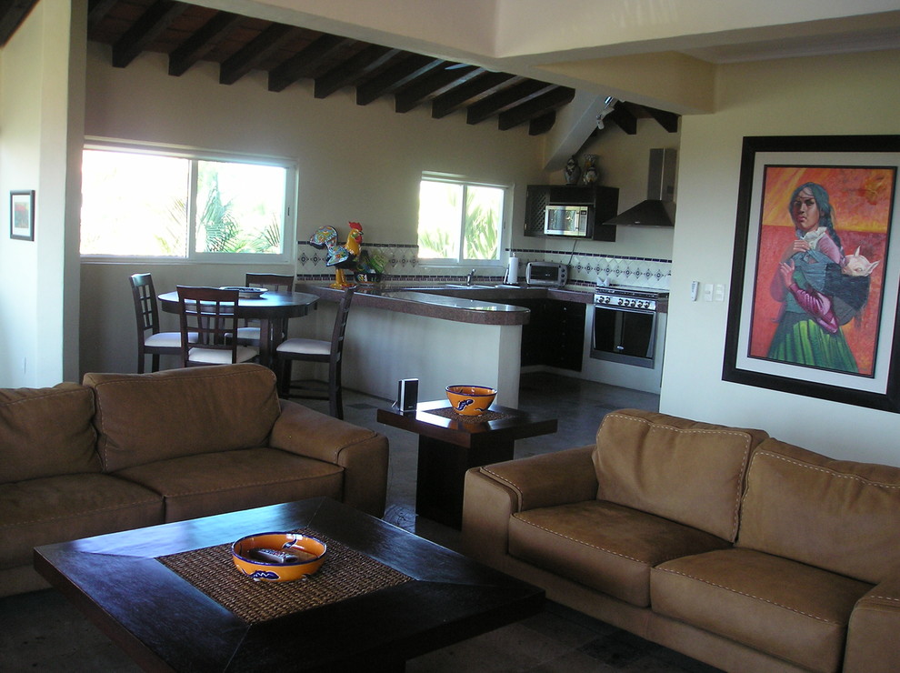 Tuscan living room photo in Other