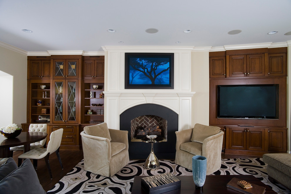 Large classic formal open plan living room in Chicago with white walls, dark hardwood flooring, a standard fireplace, a stone fireplace surround and a built-in media unit.