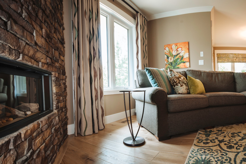 Mid-sized transitional open concept light wood floor living room photo in Edmonton with brown walls, a corner fireplace, a tile fireplace and a tv stand