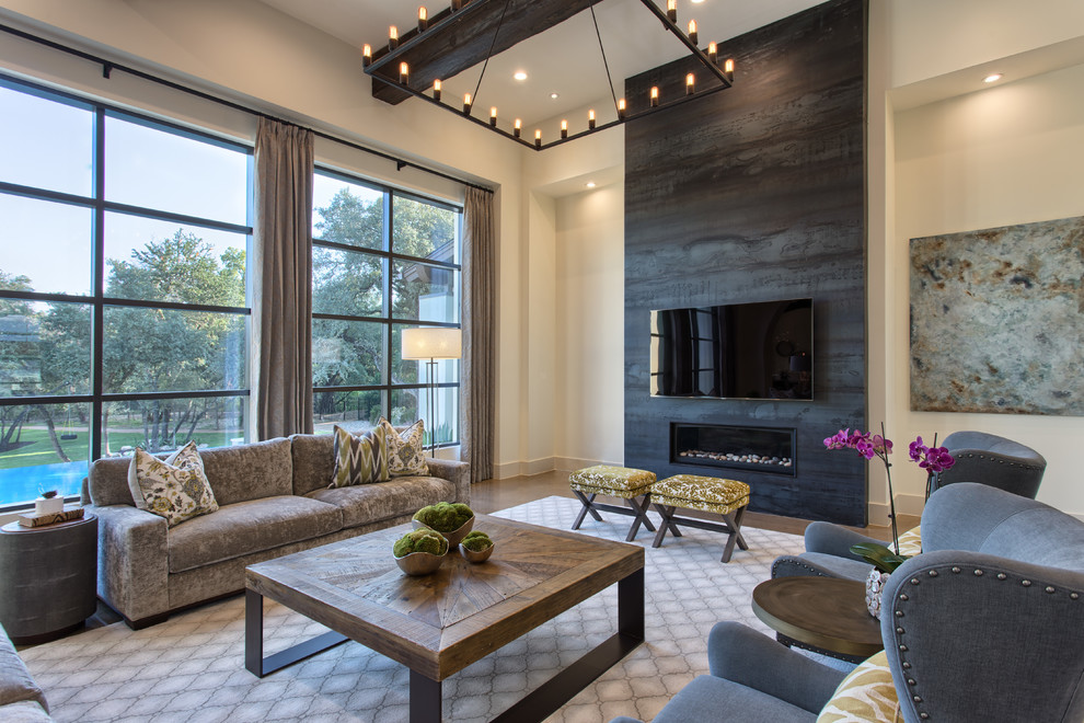 Photo of a traditional open plan living room in Austin with a ribbon fireplace and a wall mounted tv.