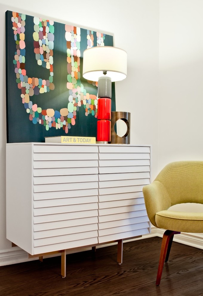 Minimalist living room photo in Toronto with white walls