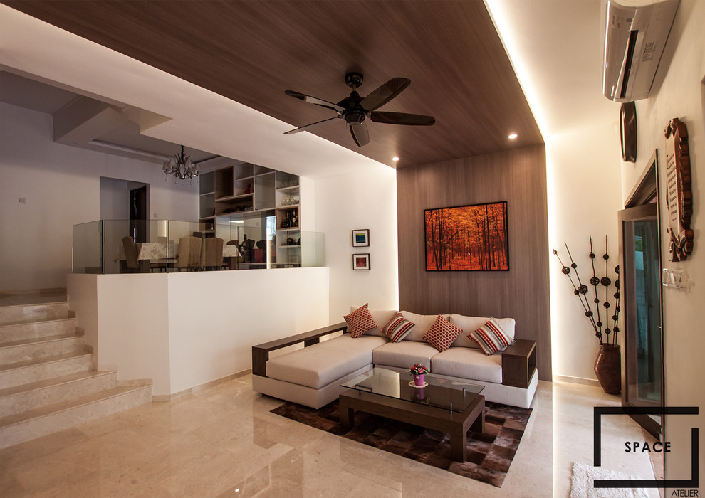 Design ideas for a large modern formal open plan living room in Singapore with brown walls, marble flooring and a wall mounted tv.