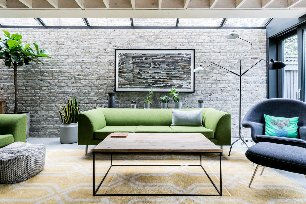 Idee per un soggiorno design di medie dimensioni con pavimento grigio