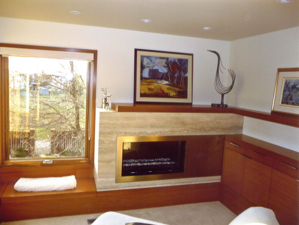 Calgary Residence • Ocean Silver Travertino Contemporary Living Room Calgary by ICON