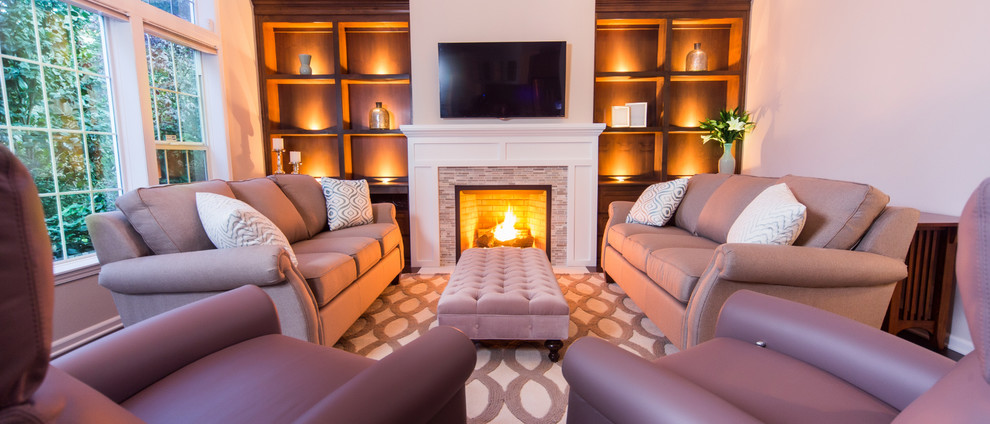 This is an example of a small enclosed living room in Sacramento with purple walls, carpet, a standard fireplace, a tiled fireplace surround and a wall mounted tv.