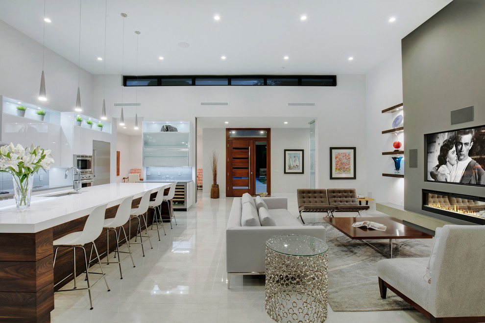 Esempio di un soggiorno minimalista di medie dimensioni e aperto con pareti bianche, pavimento in gres porcellanato, camino lineare Ribbon, TV a parete e pavimento bianco