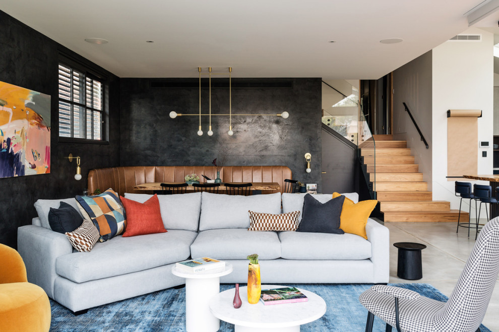 Industrial Wohnzimmer mit Betonboden und grauem Boden in Sydney