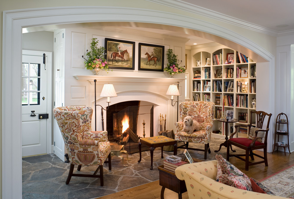 Living room library - traditional living room library idea in Philadelphia with beige walls, a standard fireplace and no tv