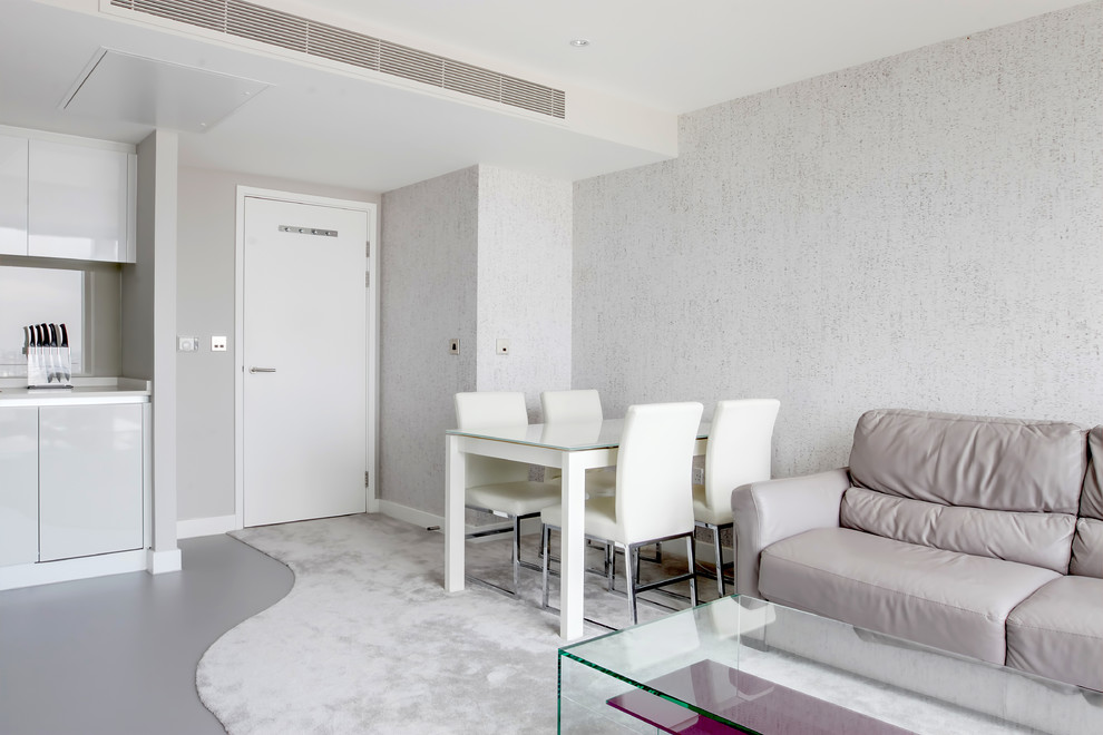 Idéer för små funkis vardagsrum, med grå väggar och heltäckningsmatta