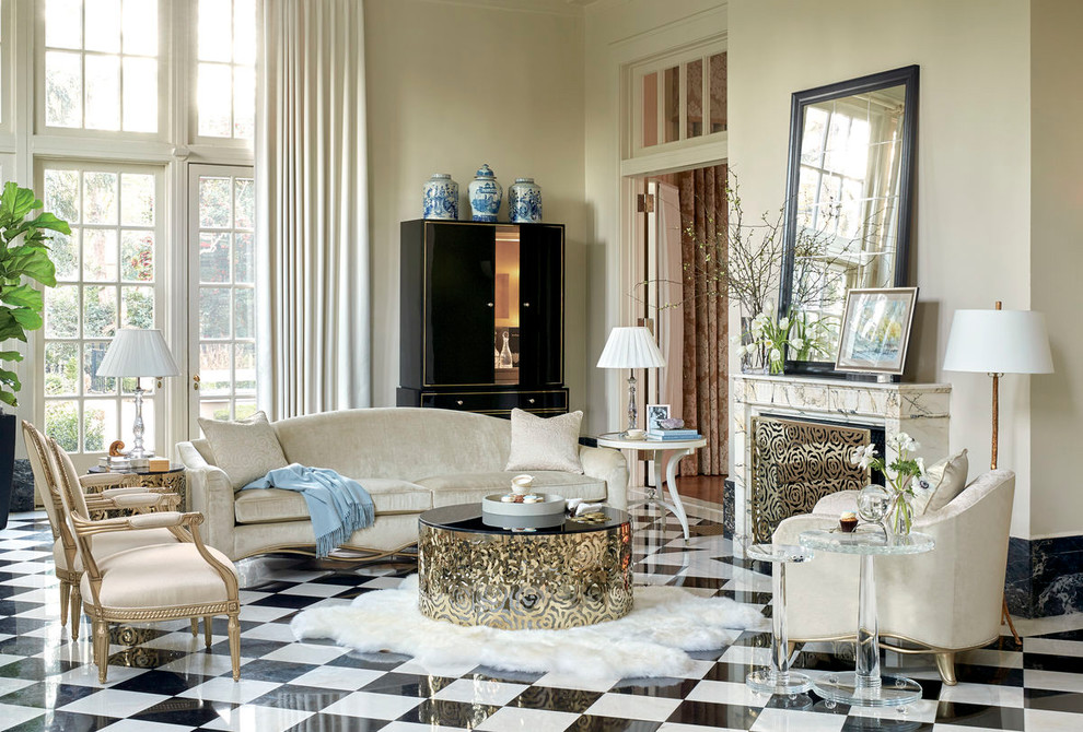 Esempio di un soggiorno design con sala formale, pareti beige, camino classico, cornice del camino piastrellata e pavimento multicolore