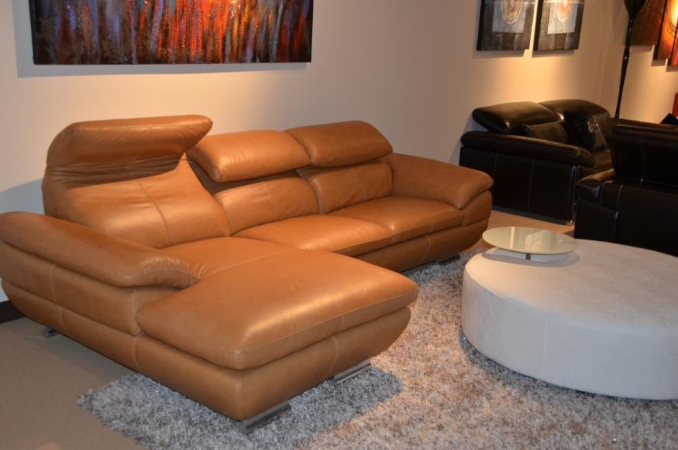 stocked caramel leather sectional sofa