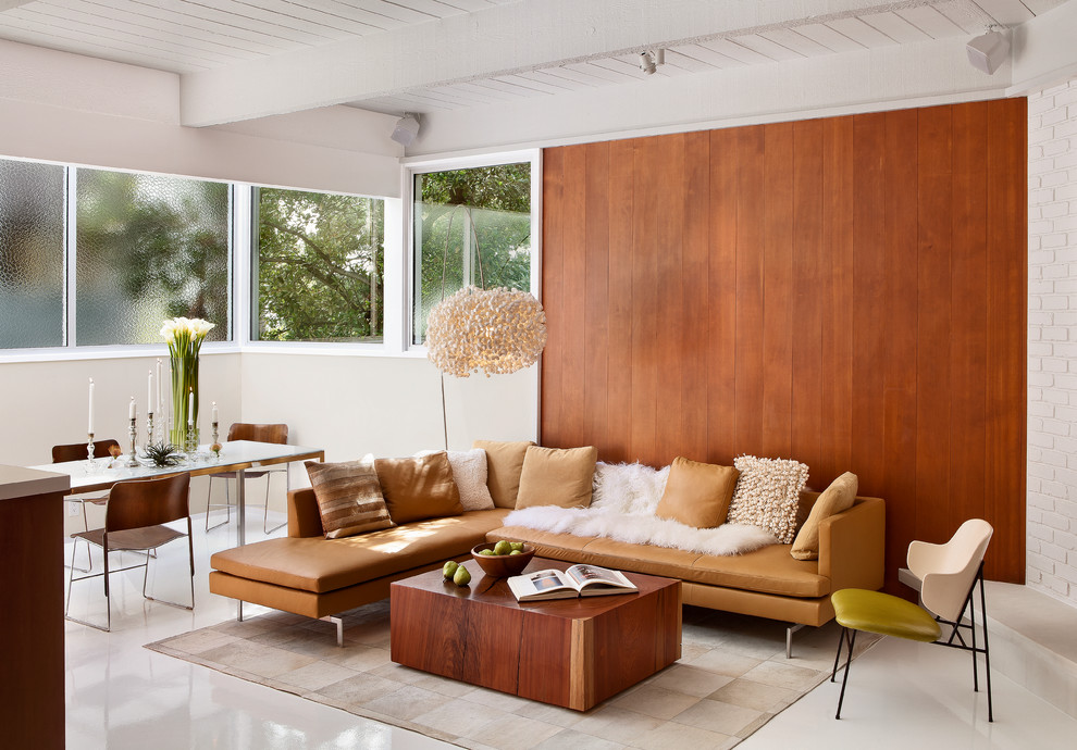 This is an example of a retro open plan living room feature wall in San Francisco.