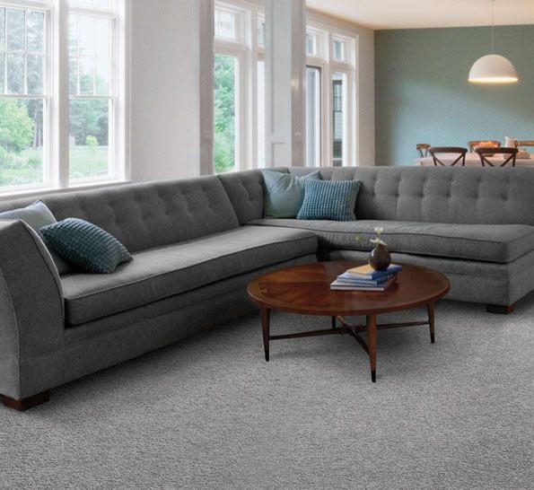 Medium sized retro open plan living room in Chicago with white walls and carpet.