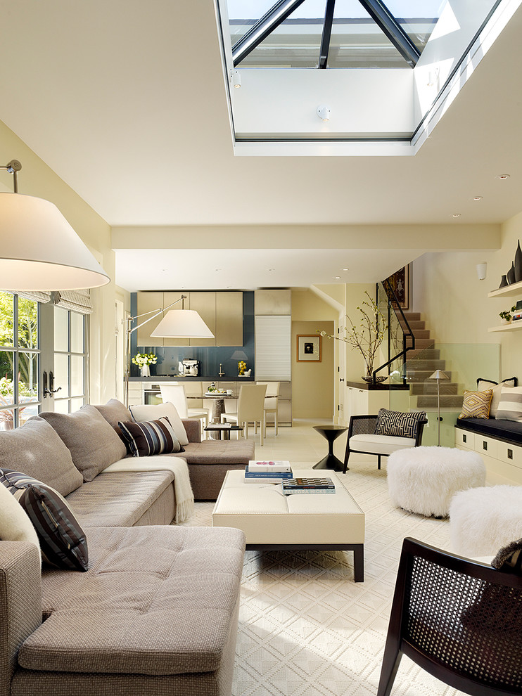 Example of a trendy open concept living room design in San Francisco with beige walls